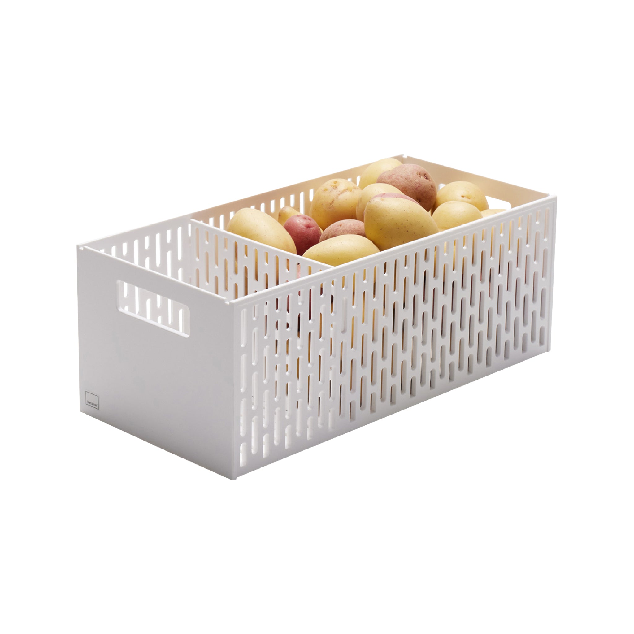 Witte opbergbox met perforatie gevuld met aardappelen